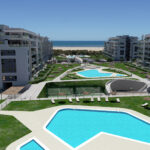 Vista general, jardines y piscinas Residencial Los Camaleones - Isla Canela